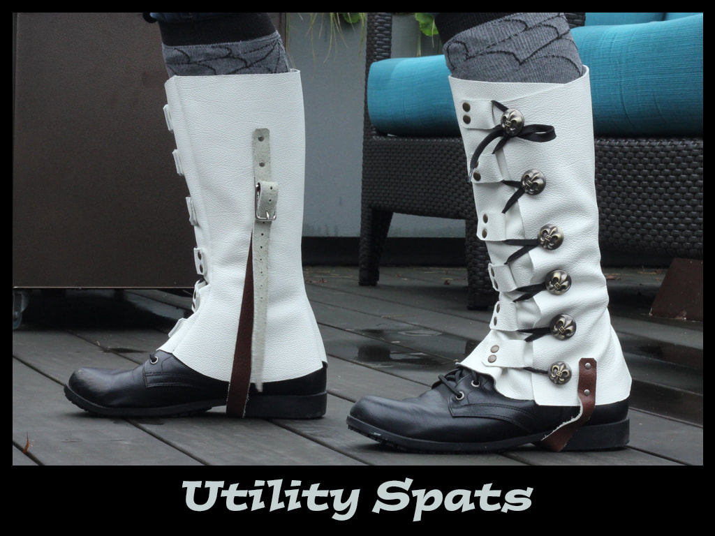 White leather utility spats with fleur de lis buttons.
